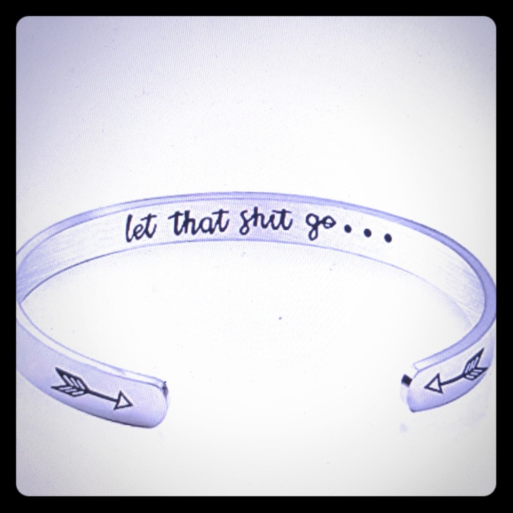 Woman’s bracelet with quote engraved.